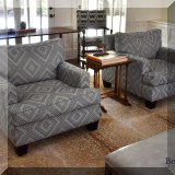 F18. Pair of Barnard Interiors club chairs with geometric pattern upholstery. 31”h x 36”w x 42”d 